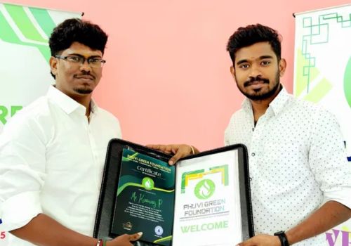 Admin Panel Member Mr. Kiranraj (on the right) receives his member kit.
