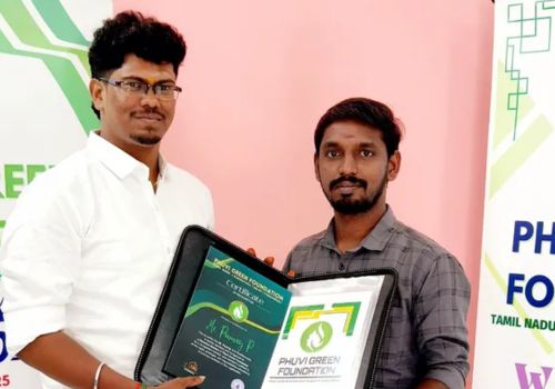 Admin Panel Member Mr. Pounraj (on the right) receives his member kit.